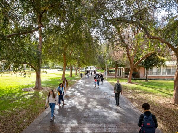 Students walking to and fro at UC Riverside.