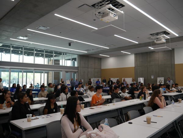 Rewrite, Rebuild Student Symposium attendance that took up entire space
