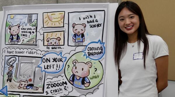 Student standing by her poster about scooter traffic at UCR