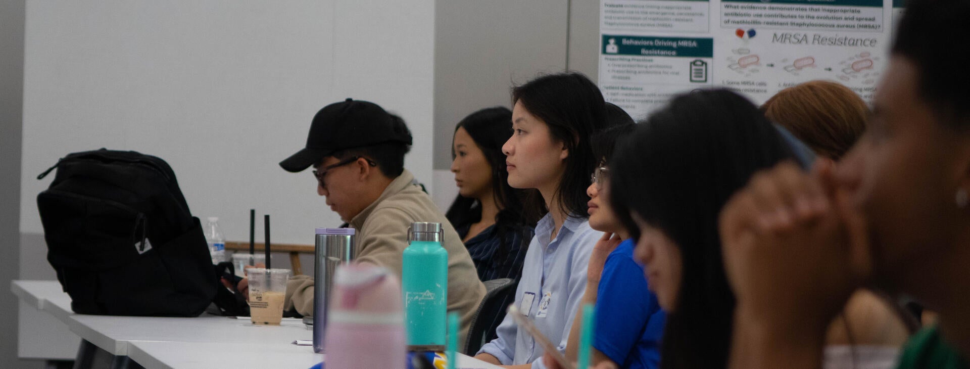 Students focused in the symposium