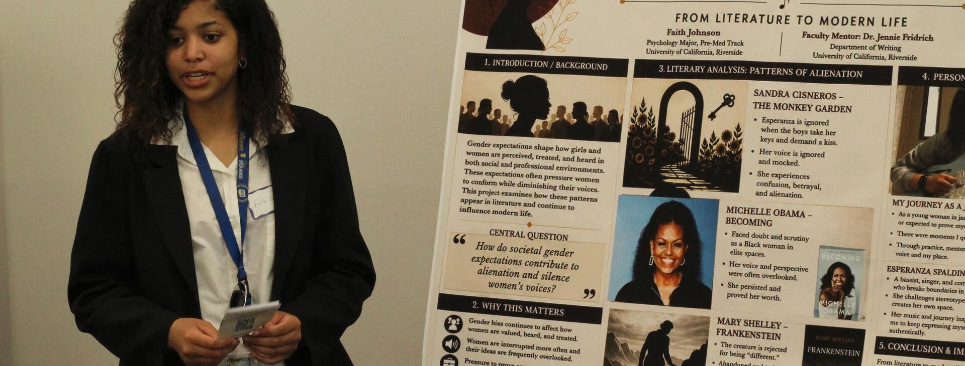 Student presenting poster about silenced voices